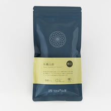 Shiraore Tea package with a blue front and green label on a white background